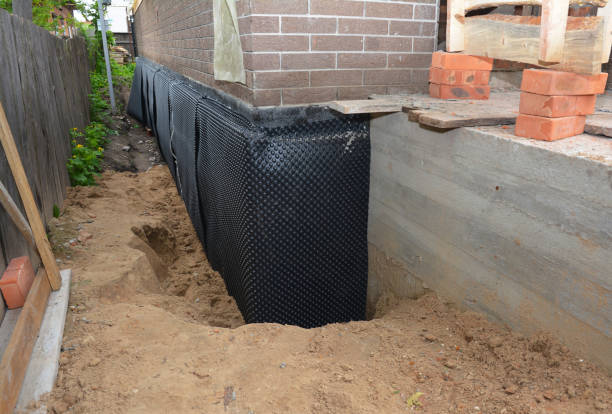 Happy homeowners after waterproofing job in Vandalia